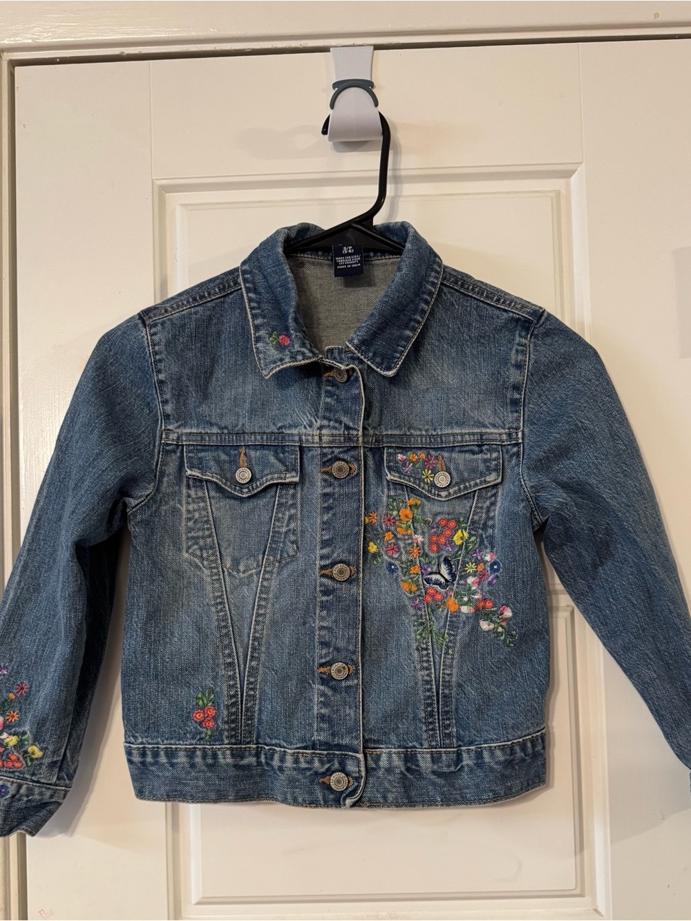 GAP Kids Embroidered Blue Denim Jacket with Multicolor Floral Details. Size 5-6